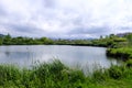 Beautiful lake landscape with dramatic sky on an autumn day