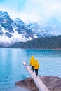 The beautiful Lake moraine at sunset, Beautiful turquoise waters of the Moraine lake with snow-covered rocky mountains Royalty Free Stock Photo