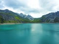 Beautiful lake in the mountains blue water cloudy sky Royalty Free Stock Photo