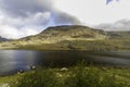 Beautiful lake and Mountains Sun and cloud. Ogwen Cottage, Snowdonia, Wales, wideangle Royalty Free Stock Photo