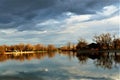 Beautiful lake panorama with clouds and trees Royalty Free Stock Photo