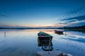 Beautiful lake sunset with fisherman boats Royalty Free Stock Photo