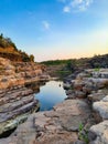 A beautiful lake surrounded by rocky mountain at Chidiya Bhadak, Indore, Madhya Pradesh, India