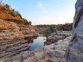 A beautiful lake surrounded by rocky mountain at Chidiya Bhadak, Indore, Madhya Pradesh, India