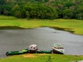 Beautiful Lake and Trees and travel boats