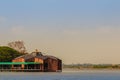 Beautiful lake view with the wooden pavilion at Bueng See Fai, the public park with lake at Muang district, Pichit province, Thail Royalty Free Stock Photo