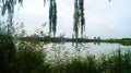 Beautiful Waterscape Park with Uniform Sky and Water Royalty Free Stock Photo