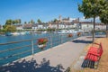 Beautiful lakeside promenade with bench, tourist resort Rapperswil, view to harbor and castle