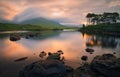 Beautiful lakeside sunrise landscape scenery of Twelve pines Island surrounded by mountains at Connemara national Park, Royalty Free Stock Photo