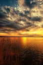 Beautiful lakeside sunset with dramatic sky and clouds