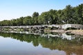 Beautiful lakeside vacation homes at calm idyllic lake in dutch holiday park - Arcen, Limburg, Netherlands Royalty Free Stock Photo