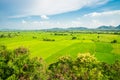 Beautiful landcape rice green field, mountain with blue sky in s Royalty Free Stock Photo