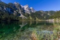 Beautiful landscape of alpine lake with crystal clear green water and mountains in background, Gosausee, Austria Royalty Free Stock Photo