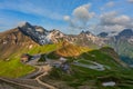 Beautiful landscape from Alps with curved road and mountain hut Royalty Free Stock Photo