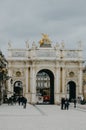 Beautiful landscape of arc du triumphe with people walking by in interior France