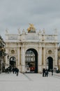 Beautiful landscape of arc du triumphe with people walking by in interior France Royalty Free Stock Photo