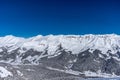 Beautiful landscape of the Arkhyz ski resort with mountains, snow, forest on sunny winter day. Caucasus Mountains, Russia Royalty Free Stock Photo