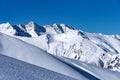 Beautiful landscape of the Arkhyz ski resort with mountains, snow, forest on sunny winter day. Caucasus Mountains, Russia Royalty Free Stock Photo