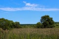 Landscape Photo - Green Field, Clouds And Blue Sky. Nature, Ecology, Travel Concept. Royalty Free Stock Photo