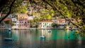 Beautiful landscape with bay and colorful buildings on the background in the town of Asos , Greece, Kefalonia.