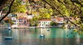 Beautiful landscape with bay and colorful buildings on the background in the town of Asos , Greece, Kefalonia.