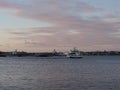 View of ship in Baltic sea at sunset and view of Helsinki, Finland