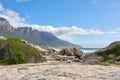 Beautiful landscape of Camps Bay in Cape Town, South Africa. Scenic mountains and rocks near the ocean or sea with a Royalty Free Stock Photo