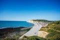 Beautiful landscape on the cliff, city of Etretat and the English Channel in sunny spring day. Etretat, Seine-Maritime