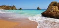 Beautiful landscape: cliffs in turquoise Atlantic ocean on the beach Praia Dona Ana, Lagos, Portugal Royalty Free Stock Photo