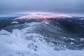 Beautiful landscape on the cold winter day. Fantastic sunrise. High mountain with snow white peaks. Snowy background Royalty Free Stock Photo