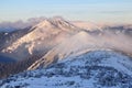 Beautiful landscape on the cold winter day. High mountain with snow white peaks. Snowy background Royalty Free Stock Photo