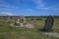 Men-an-Tol standing stones with a tin mine in the background, Cornwall Royalty Free Stock Photo