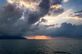 Beautiful landscape, dark dramatic storm clouds over the sea at sunset Royalty Free Stock Photo