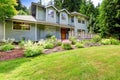 Beautiful landscape design with sawdust flower bed and lawn