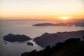 Beautiful landscape from a drone on the sea, mountains at sunset. Royalty Free Stock Photo