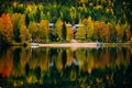 Beautiful landscape of fall colors forest reflected in the still waters of a calm lake in Finland Royalty Free Stock Photo