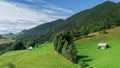 Beautiful landscape farmhouse on green hill and forest with clear blue sky travel destination Muntii Piatra Craiului