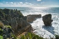 Beautiful landscape featuring large waves crashing against a rocky shoreline near the Pancake Rocks Royalty Free Stock Photo