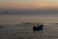 The beautiful landscape of fishing boat floating on sea with sunset blackground,thailand Royalty Free Stock Photo