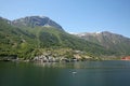 Beautiful landscape in the fjord, with reflections of the mountains in the water. Rosendal, Hardangerfjord, Norway. Royalty Free Stock Photo