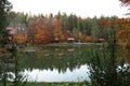 Beautiful landscape with forest and houses near lake Royalty Free Stock Photo