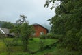 Beautiful landscape with forest and wooden house in mountains Royalty Free Stock Photo