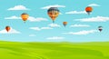 Beautiful landscape with green lawn and skyline with clouds, flying air balloons, summer time