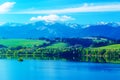 Beautiful landscape, green meadow and lake with mountain in background. Slovakia, Central Europe. Royalty Free Stock Photo