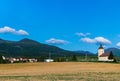 Beautiful landscape, green and yellow field, blue sky. Hungary. Royalty Free Stock Photo