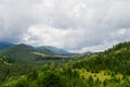 Beautiful landscape from a height. Typical Carpathian village in a valley, forest Royalty Free Stock Photo