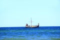 Beautiful landscape with historic rook sailing on blue sea. Marine vessel