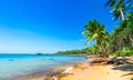 Beautiful landscape of Hon Thom beach, Phu Quoc island, Vietnam, Asia with tourist, chairs and umbrella. White sand and coco palms Royalty Free Stock Photo