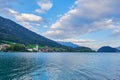 Beautiful landscape with lake, mountains, forest, clouds, house and reflection in water. Austria, Salzkammergut, Wolfgangsee Royalty Free Stock Photo