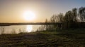 Beautiful Landscape with lake and trees under a sunset sky. Amazing Nature in Europe. Lovely place to visit at summer. Royalty Free Stock Photo